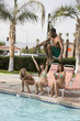 Young Friends Relaxing at Swimming Pool