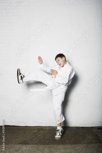 Photo: Boy practicing judo Boy practicing judo