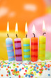 Birthday candles on colorful background Birthday candles on colorful background