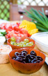 Black and green olives and sliced fresh vegetables