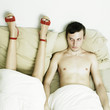 Portrait of beautiful young lovers in bed