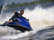 Photo: Man on WaveRunner turns left Man on WaveRunner turns left