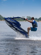 Photo: Jumping man on jet ski Jumping man on jet ski