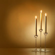 Tre candele dorate