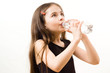 Little girl is drinking water Little girl is drinking water