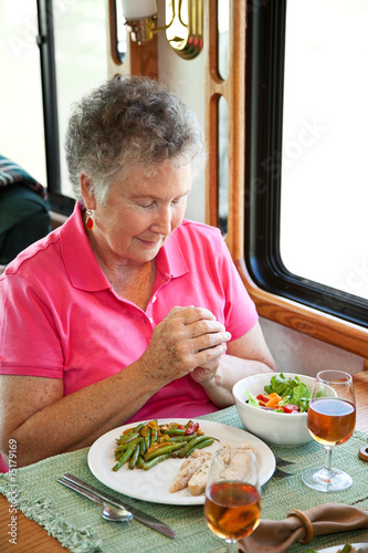 Photo: RV Senior Woman Says Grace RV Senior Woman Says Grace