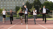 Photo: Group of Business People Sprinting Across the Finish Line Group of Business People Sprinting Across the Finish Line