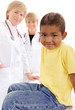 female doctors examining little child boy