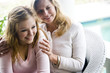 Photo: Closeup of mother with teenage daughter Closeup of mother with teenage daughter