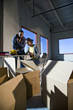Multi-ethnic businesspeople preparing new office space
