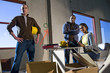 Multi-ethnic workers preparing new office space