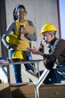 Multi-ethnic male and female construction workers
