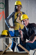 Multi-ethnic male and female construction workers