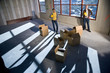 Multi-ethnic businesspeople preparing new office space