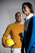 Businesspeople looking at unfinished office space