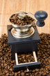 Coffee grinder ower coffe beans.