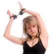 Hostage. Young woman in handcuffs.
