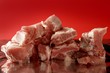Pig, pork raw meat pieces over red