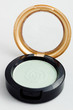 Isolated light green eyeshadow on white background Isolated light green eyeshadow on white background
