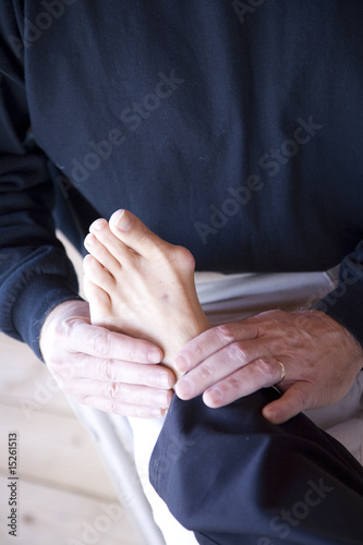 Photo: Podiatrist examines a bunion Podiatrist examines a bunion