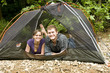 Couple camping in a tent