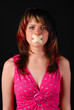 woman with cross on her mouth