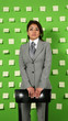 woman is behind a chair