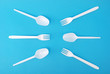 White disposable dishes, fork and spoon