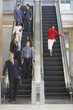 Businesspeople on escalator