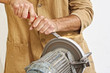 manual worker sharp his tool