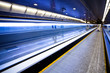 Blue moving escalator with people Blue moving escalator with people