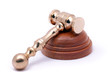 Photo: 24k gold gavel on wood block isolated 24k gold gavel on wood block isolated
