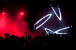 Backlight and disco light with people and DJ