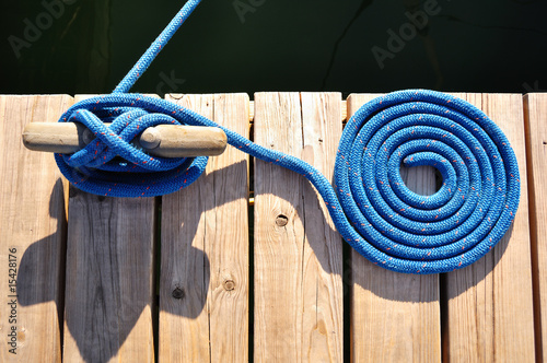 Photo: Coiled Blue Rope and Cleat Coiled Blue Rope and Cleat