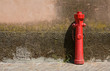 fire faucet, standing at a wall