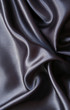 Smooth elegant black silk as background Smooth elegant black silk as background