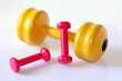 Foto: colorful dumb bells colorful dumb bells