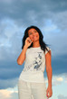 Girl,phone and sky