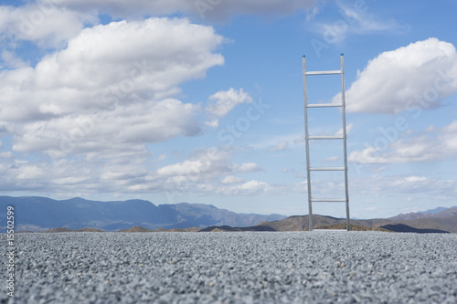 Photo: Ladder outdoors with blue sky and clouds Ladder outdoors with blue sky and clouds