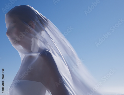 Photo: Woman with a sheer sheet Woman with a sheer sheet