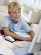 Young boy working on his computer
