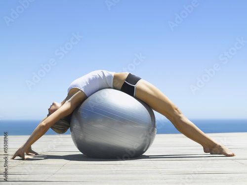 Photo: Woman working out with an exercise ball Woman working out with an exercise ball