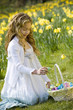Young Girl Collecting Easter Eggs