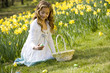 Young Girl Collecting Easter Eggs