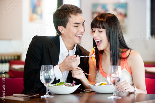 Photo: Man Feeding Girlfriend Man Feeding Girlfriend