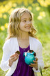 Young Girl Holding Easter Egg