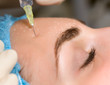cosmetic injection of botox to the pretty female face