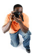 Student photographer kneeling to take a picture Student photographer kneeling to take a picture