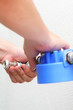Tightening piping connections for a water filter