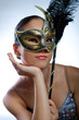 Venetian mannequin with a carnival mask
